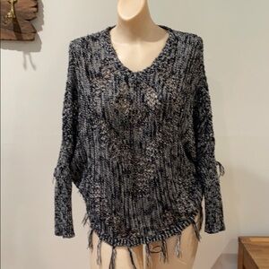 Love on a hanger raw hem pancho sweater black